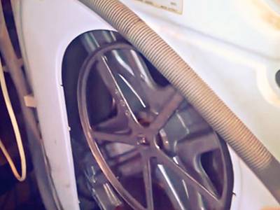 Вид стиральной машины Indesit 84 TX сзади